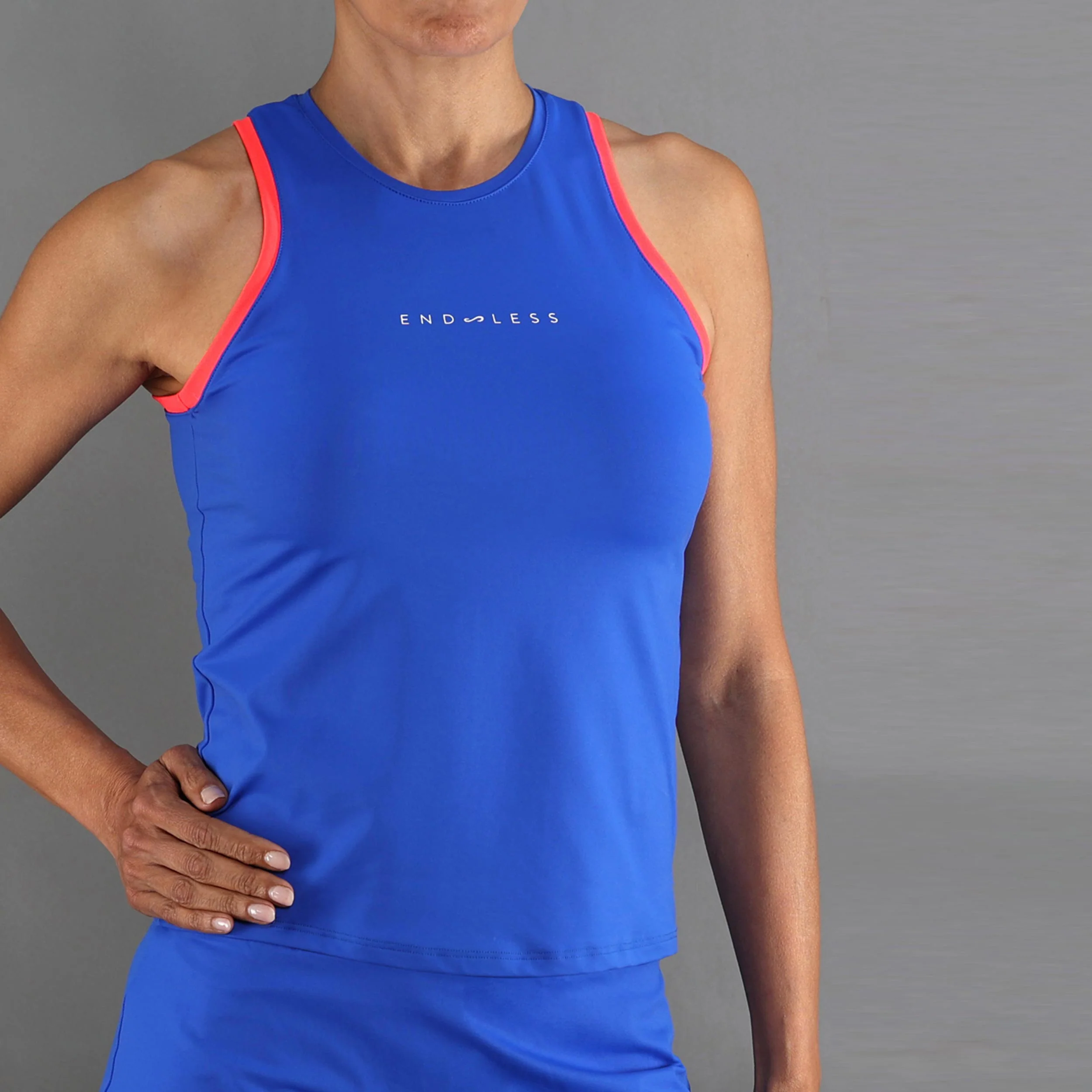 Essential Camiseta de tirantes Mujeres-azul, naranja - Image 3